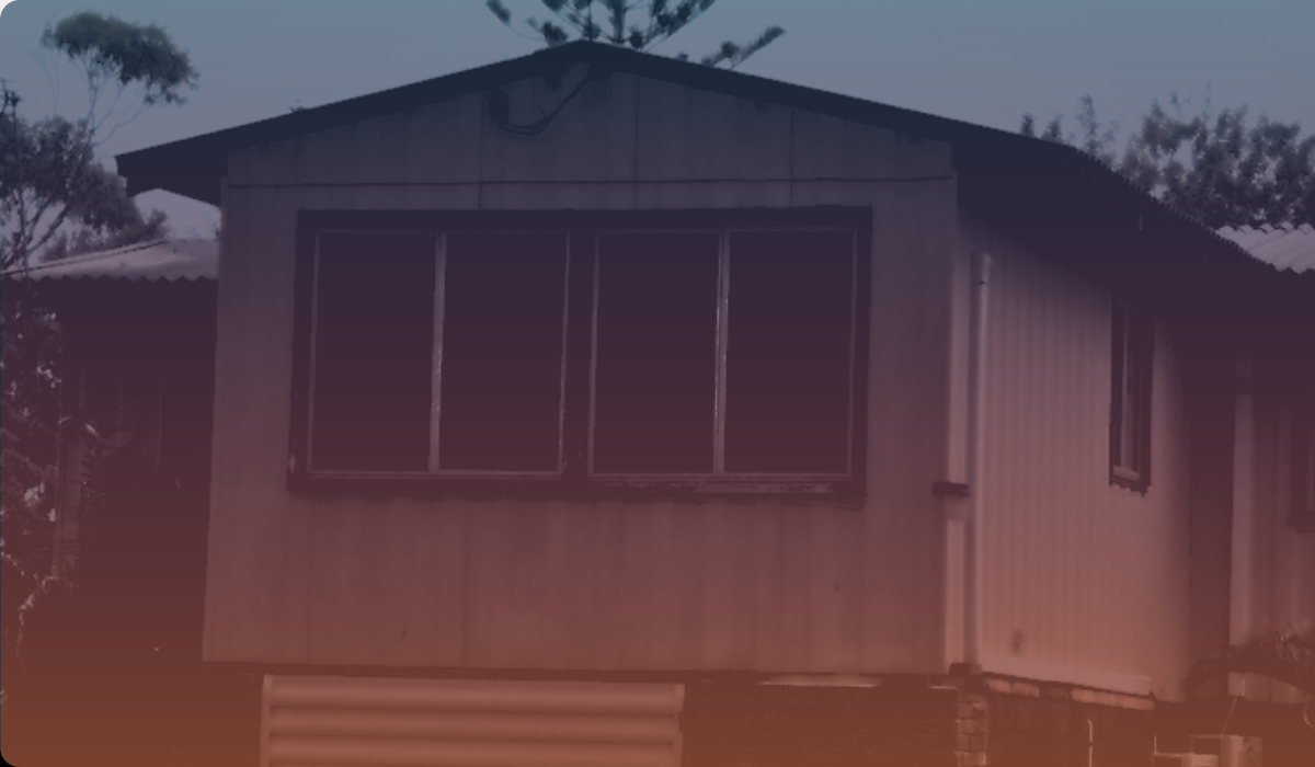 A house tinted orange and dark blue.