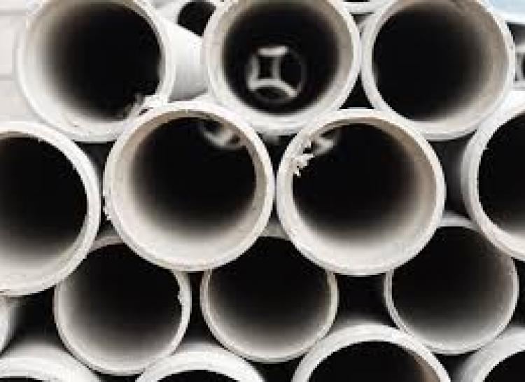 image of sewer pipes stacked 