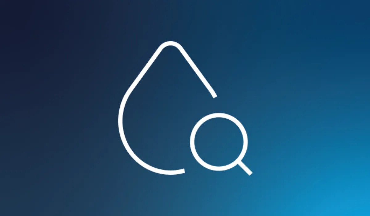 An image of a water drop on a blue background