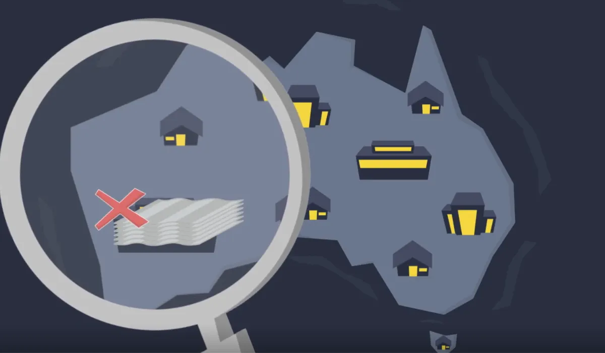 An image of Australia, with buildings drawn on it and a magnifying glass hovering over it